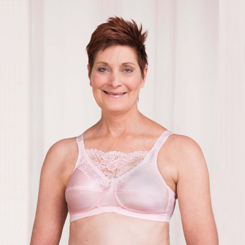 woman wearing pink bra with lace detail